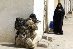 Soldier and Iraqi woman
